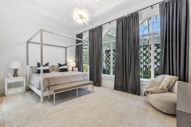 bedroom featuring a notable chandelier, light colored carpet, ornamental molding, and multiple windows