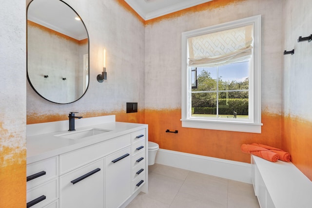 bathroom featuring tile patterned flooring, vanity, toilet, and ornamental molding