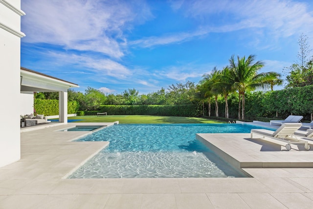 view of swimming pool with a patio area and pool water feature