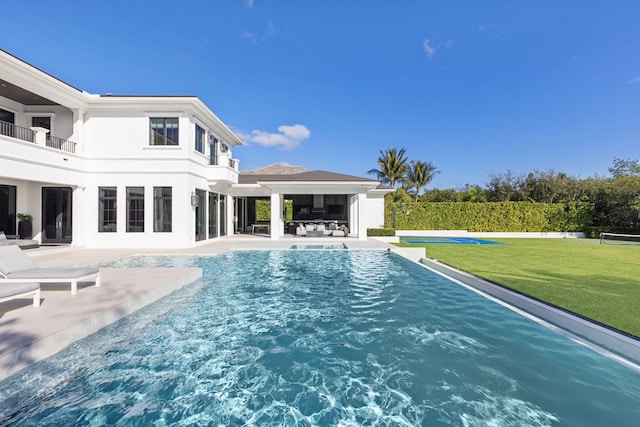 view of pool with a patio