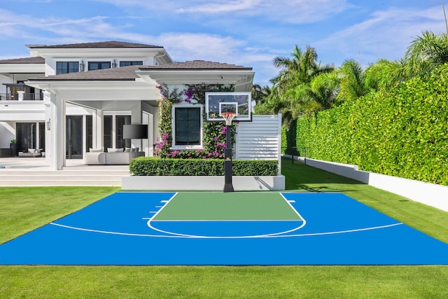 view of basketball court featuring a yard