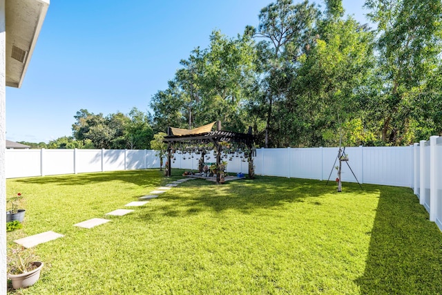 view of yard with a pergola