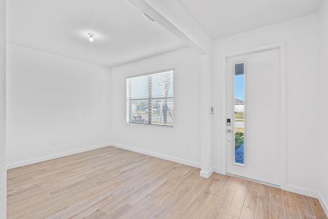 entrance foyer with light wood-type flooring