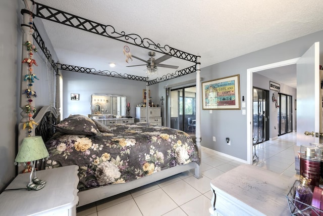 tiled bedroom featuring access to outside, ceiling fan, and a textured ceiling