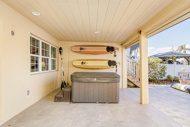 view of patio / terrace featuring a hot tub