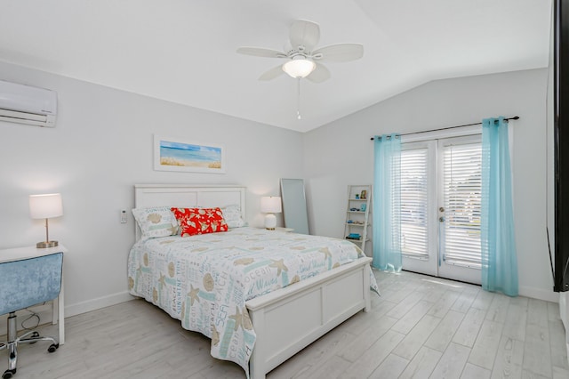 bedroom with ceiling fan, light wood-type flooring, access to exterior, vaulted ceiling, and an AC wall unit