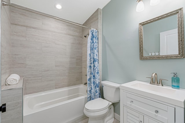 full bathroom featuring toilet, vanity, and shower / bath combination with curtain