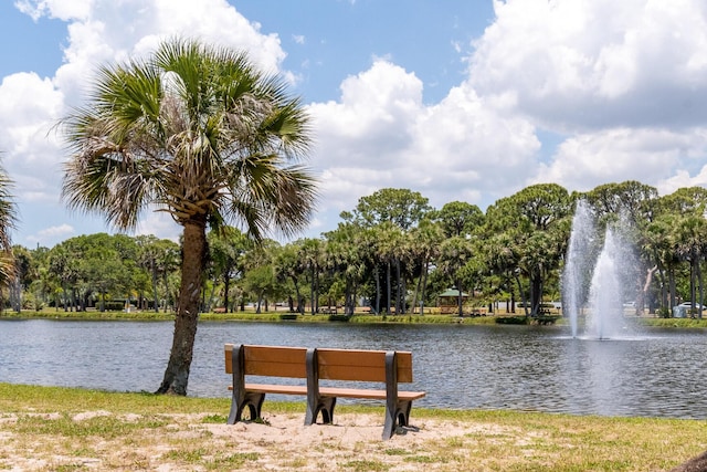 surrounding community with a water view