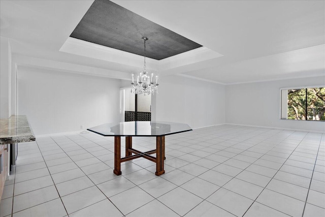 unfurnished dining area with a tray ceiling, crown molding, light tile patterned floors, and a chandelier