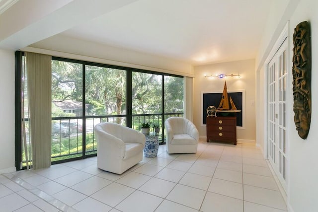 unfurnished room with light tile patterned floors