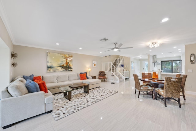 tiled living room featuring ceiling fan and crown molding