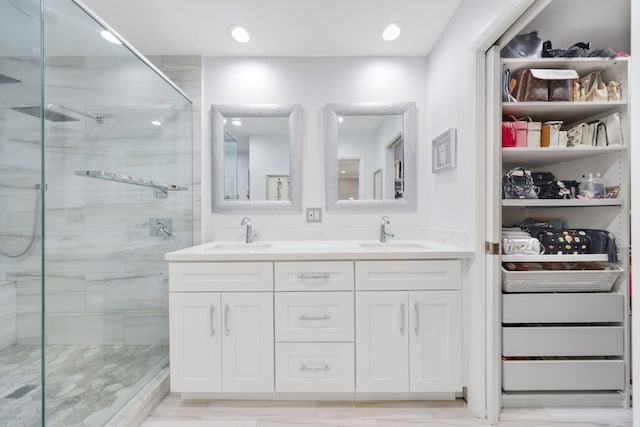 bathroom featuring vanity and walk in shower