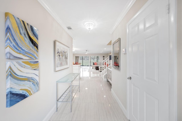 corridor featuring crown molding and light tile patterned flooring