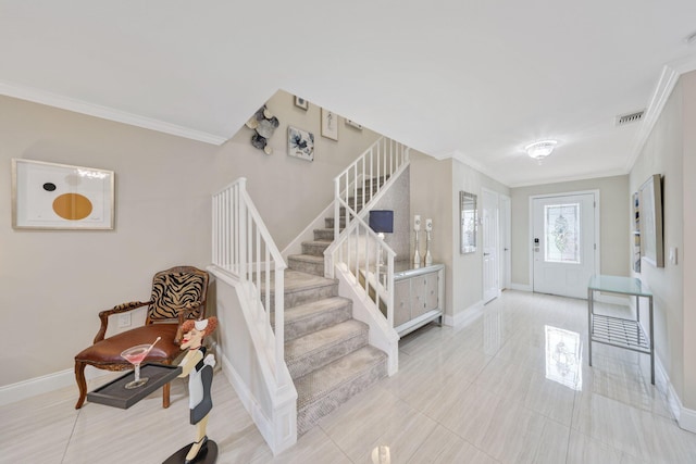 entryway with crown molding