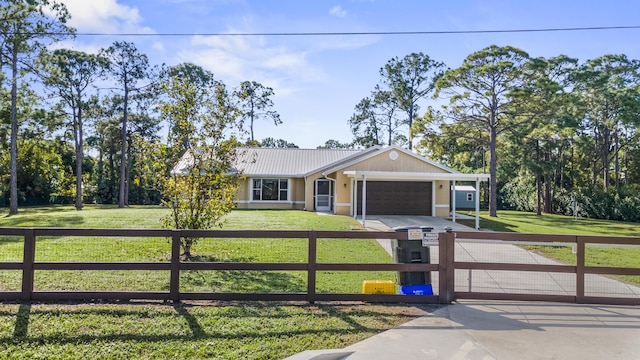 single story home featuring a garage and a front lawn