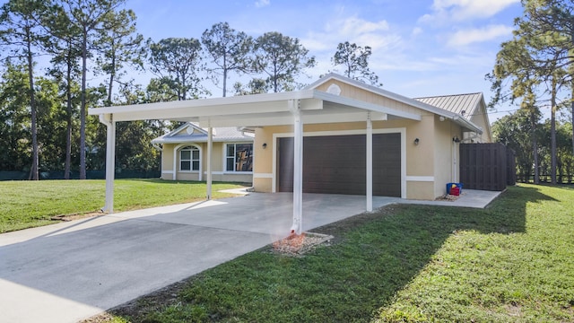 single story home featuring a garage and a front yard