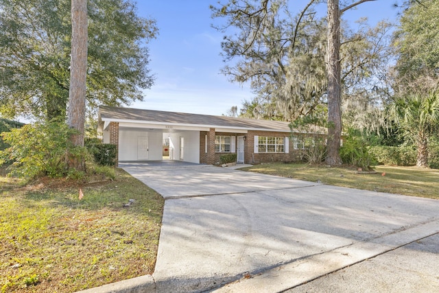 ranch-style house with a front lawn and a carport