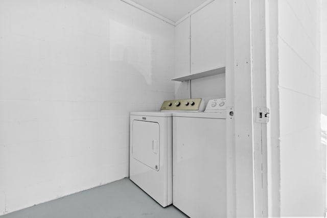 washroom with independent washer and dryer