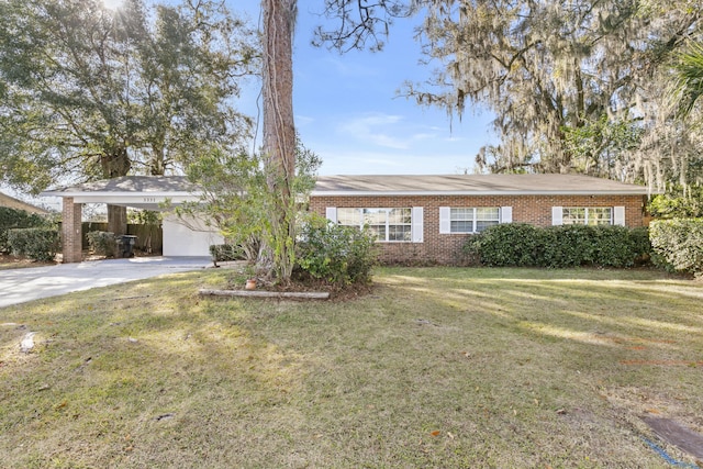 3331 NW 27th Ave, Gainesville, FL 32605 - single story home featuring a carport, brick siding, driveway, and a front lawn