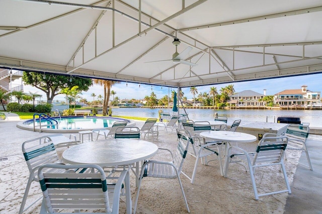 view of patio / terrace featuring a gazebo and a water view