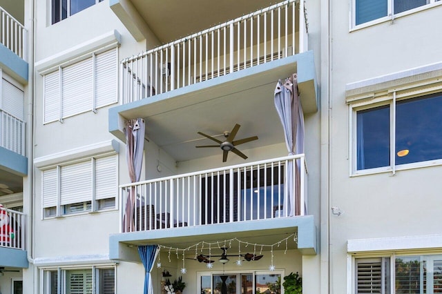 exterior space featuring ceiling fan