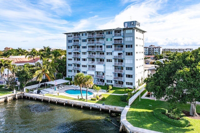 view of building exterior featuring a water view