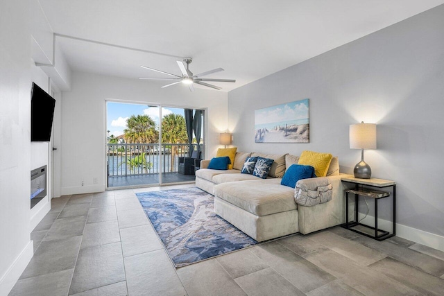 living room featuring ceiling fan