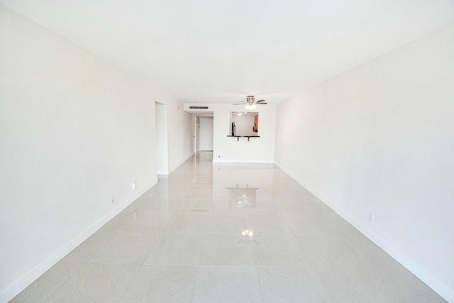 empty room featuring ceiling fan