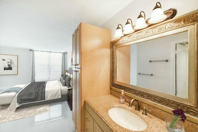 bathroom with tile patterned floors and vanity