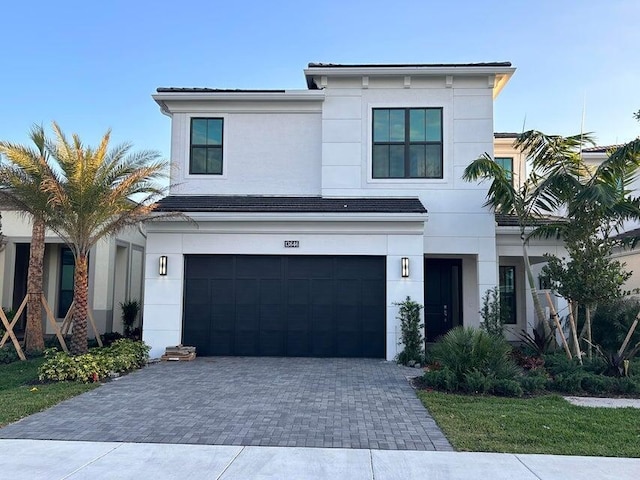 view of front of property with a garage