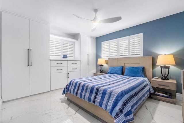 bedroom featuring ceiling fan