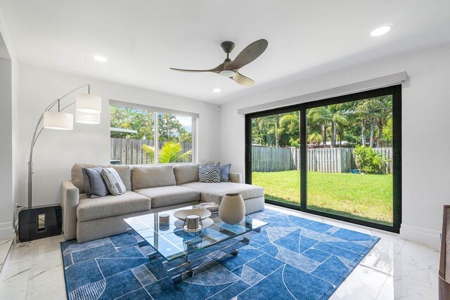 living room with ceiling fan