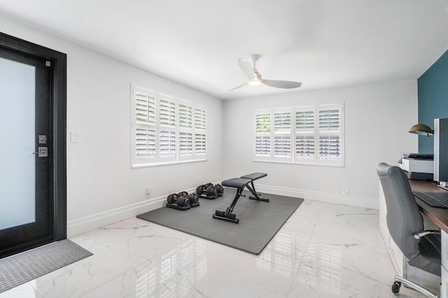 workout area featuring ceiling fan