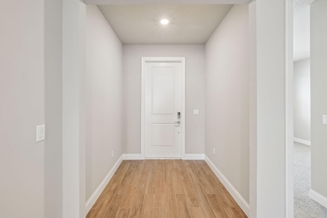 hall featuring light hardwood / wood-style floors