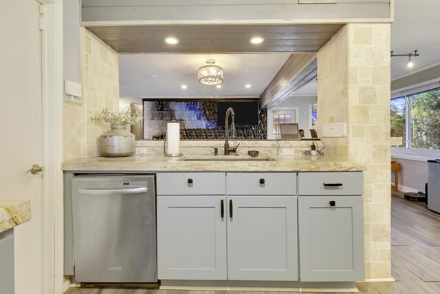 kitchen featuring white cabinetry, appliances with stainless steel finishes, light hardwood / wood-style floors, and gray cabinetry