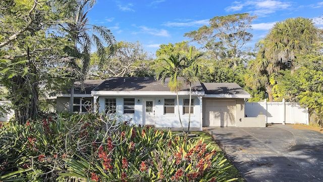 single story home with a garage