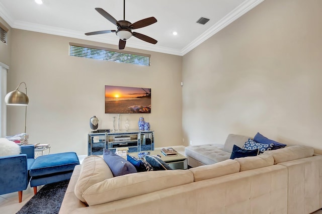 living room featuring ceiling fan and crown molding