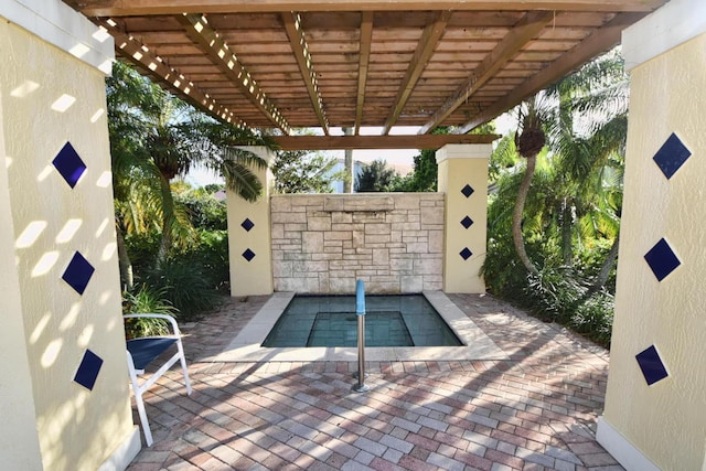 view of swimming pool featuring a pergola