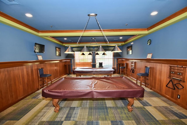 rec room featuring billiards, ornamental molding, and wood walls