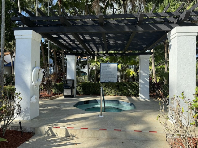 view of swimming pool with a pergola and a hot tub