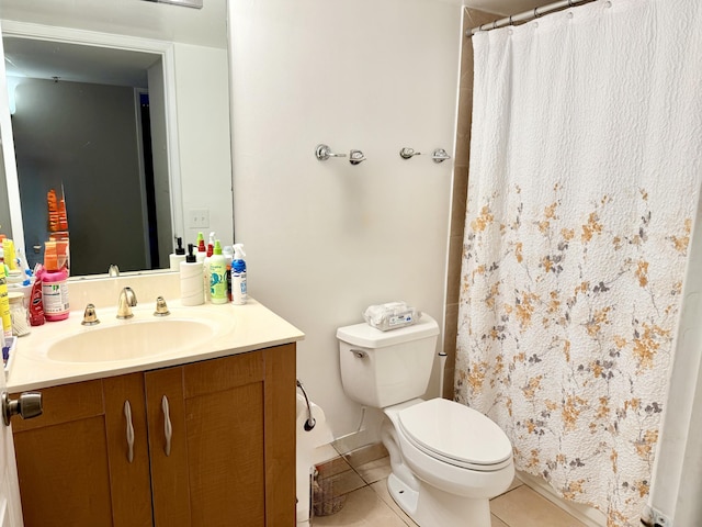 3113 Clint Moore Rd Unit 103, Boca Raton, FL 33496 - full bathroom featuring toilet, vanity, tile patterned floors, and a shower with shower curtain