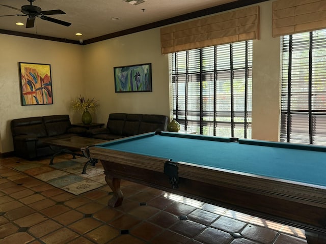 rec room featuring ceiling fan, ornamental molding, and pool table