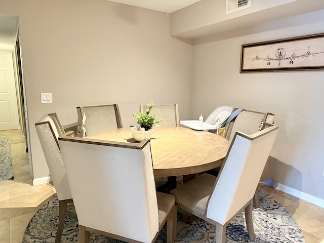 3113 Clint Moore Rd Unit 103, Boca Raton, FL 33496 - dining space with baseboards and tile patterned flooring