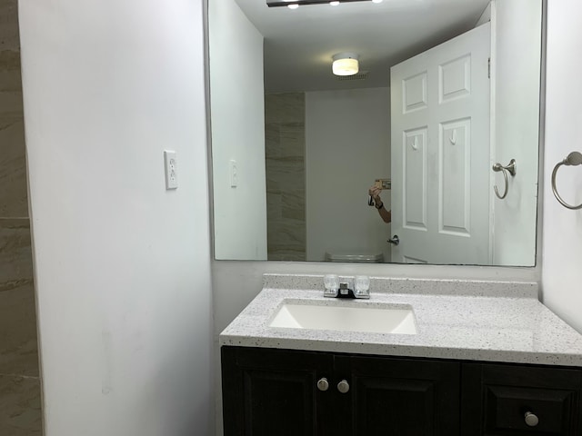 3113 Clint Moore Rd Unit 103, Boca Raton, FL 33496 - bathroom with vanity and toilet