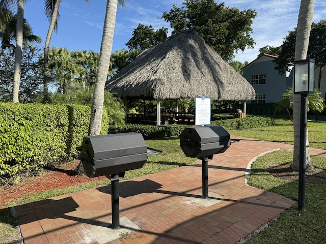 view of community with a gazebo and a yard