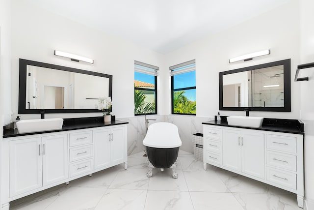 bathroom with vanity, tile walls, and plus walk in shower