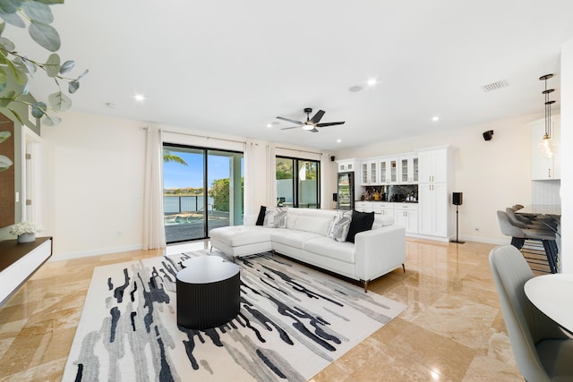 living room with ceiling fan