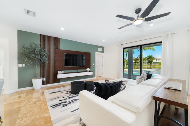 living room with ceiling fan