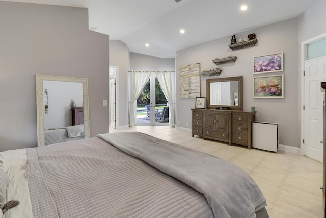 bedroom featuring access to exterior, light tile patterned floors, and lofted ceiling