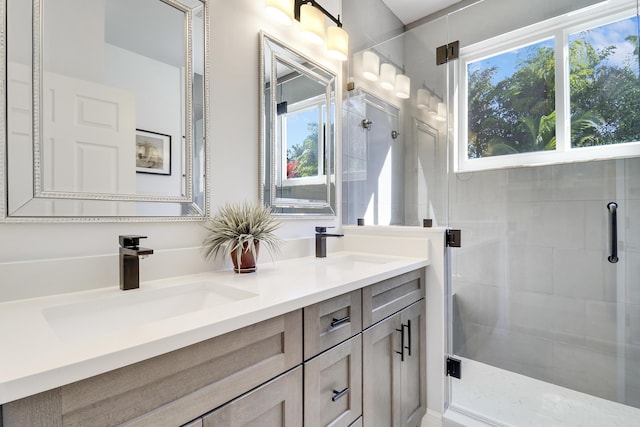 bathroom with vanity and an enclosed shower